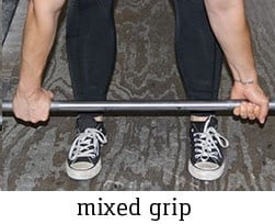 The mix grip shown here has many disadvantages but some uses for the deadlift. 